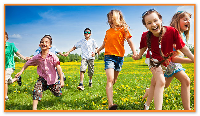 Kids Running in the Grass at Montclair Pediatric Dental Care Near Verona