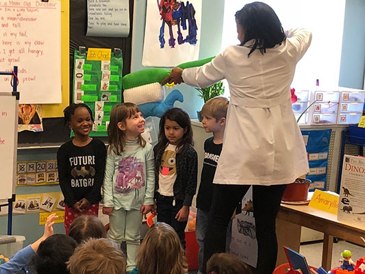 The Pediatric Dentist Dr. Manso Training on Brushing Teeth